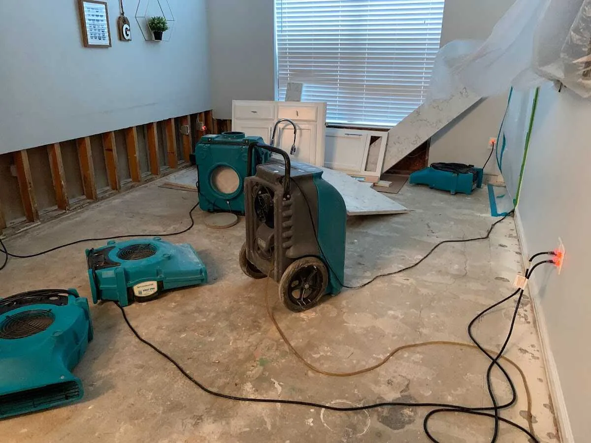 Dehumidifier in flood-cut room for Water Damage Restoration in Sherrelwood